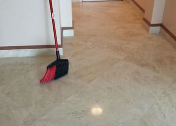 Saturnia floor deep-cleaned and then refinished to a gloss