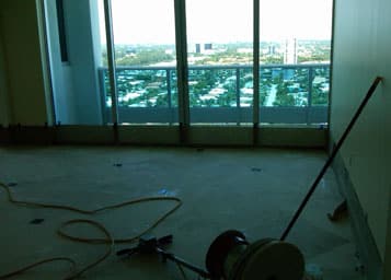 Travertine floor that was previously honed is not refinished to a polished sheen