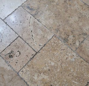 travertine tile floor damages